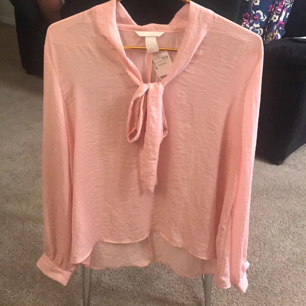 Pale/light pink blouse